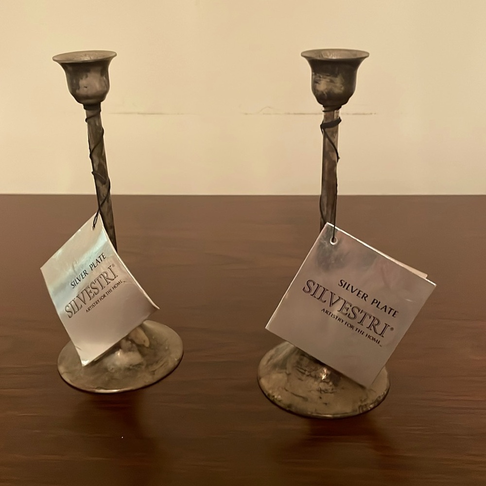 Silver plate candle holders new with tags.